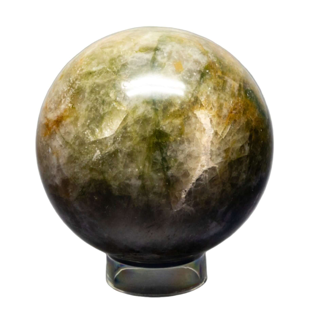 Crystal Destiny's Polished Crystals Collection: Green and brown crystal sphere for natural energy and elegance.