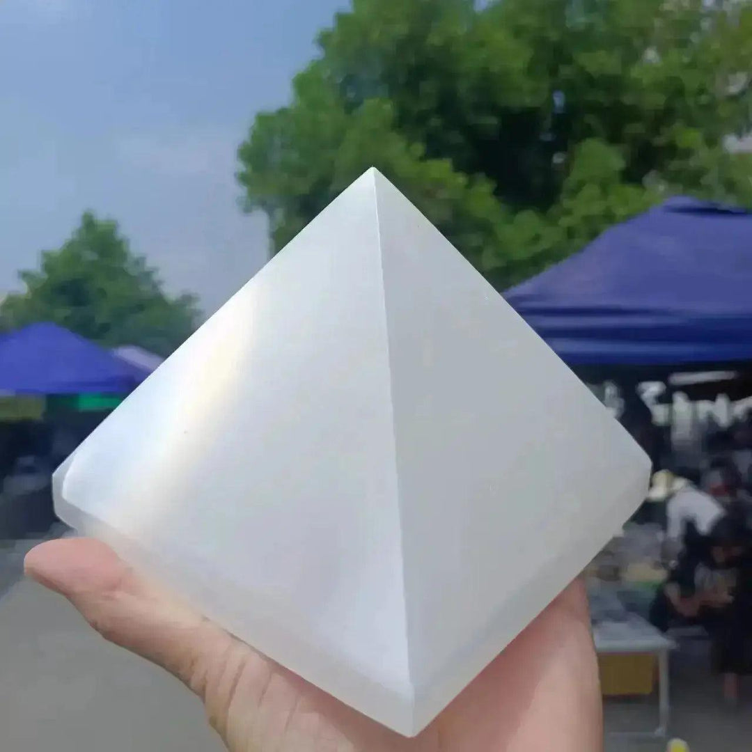 Crystal Pyramids from Crystal Destiny: clear quartz and rose quartz for spiritual energy.