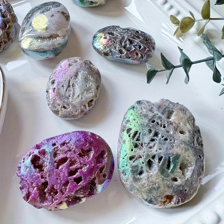 Colorful Druzy Sphalerite Titanium Bubble Palm Stones with sparkling, iridescent metallic finishes.
