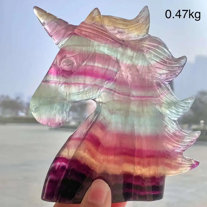 Vibrant rainbow fluorite unicorn carving, a 12CM natural stone crystal figurine for aesthetic decor.