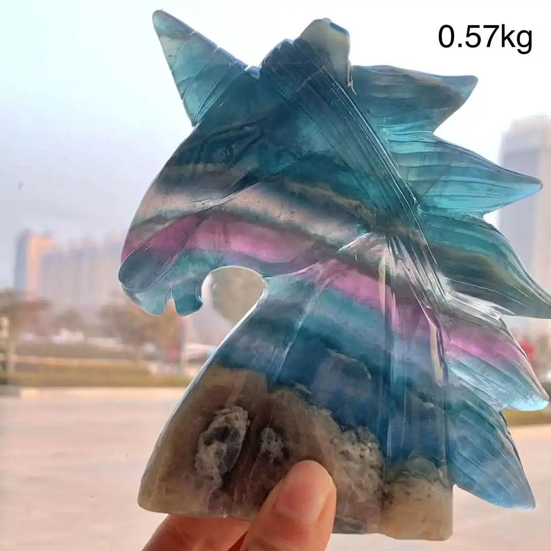 Vibrant rainbow fluorite unicorn carving, 12CM, showcasing natural stone crystals for aesthetic decor.