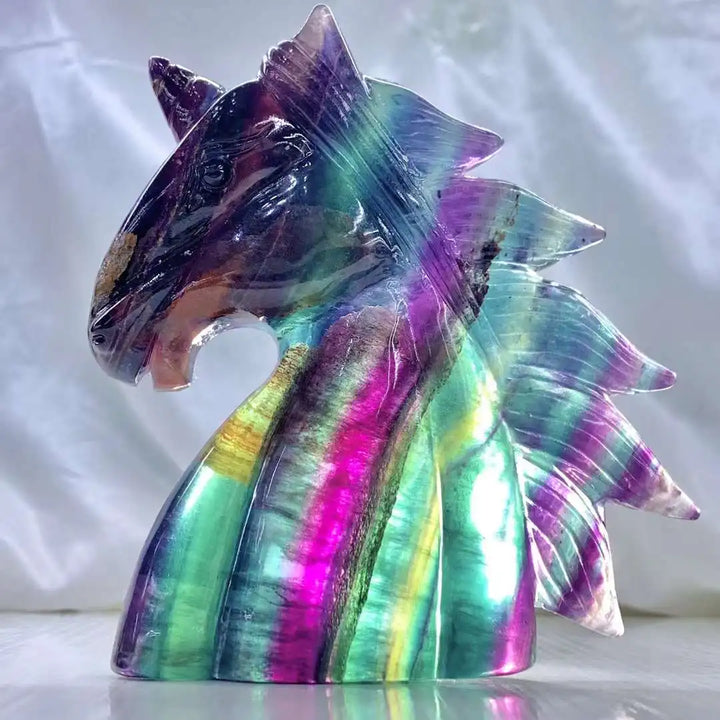 Vibrant rainbow fluorite unicorn carving, 12CM, showcasing stunning natural crystal colors for aesthetic decor.