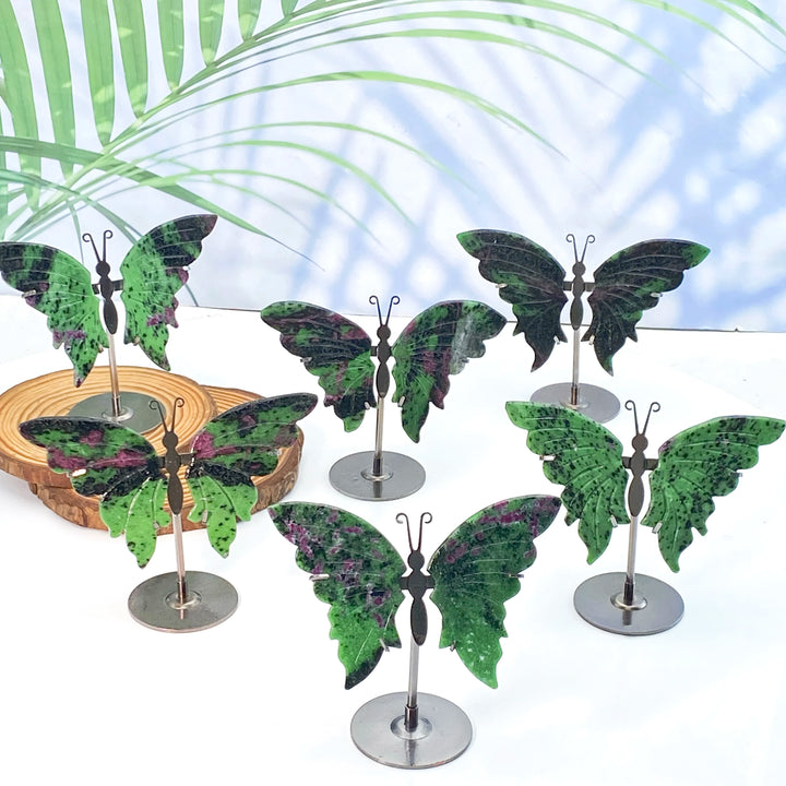 High-quality crystal butterfly wings with stands, featuring vibrant green and purple hues, perfect for healing decor or a unique gift.