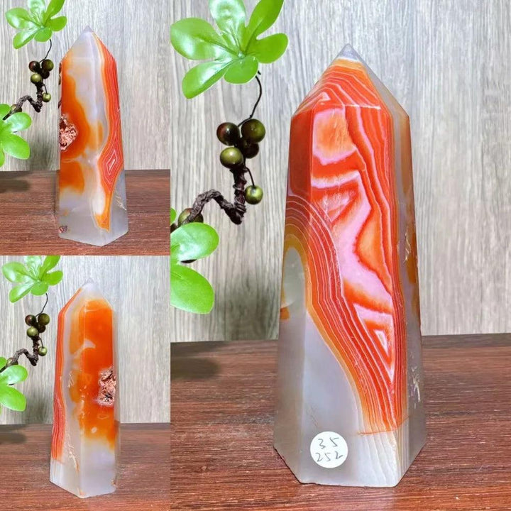 Natural red carnelian agate geode tower crystal with vibrant orange and white bands, ideal for healing and decor.
