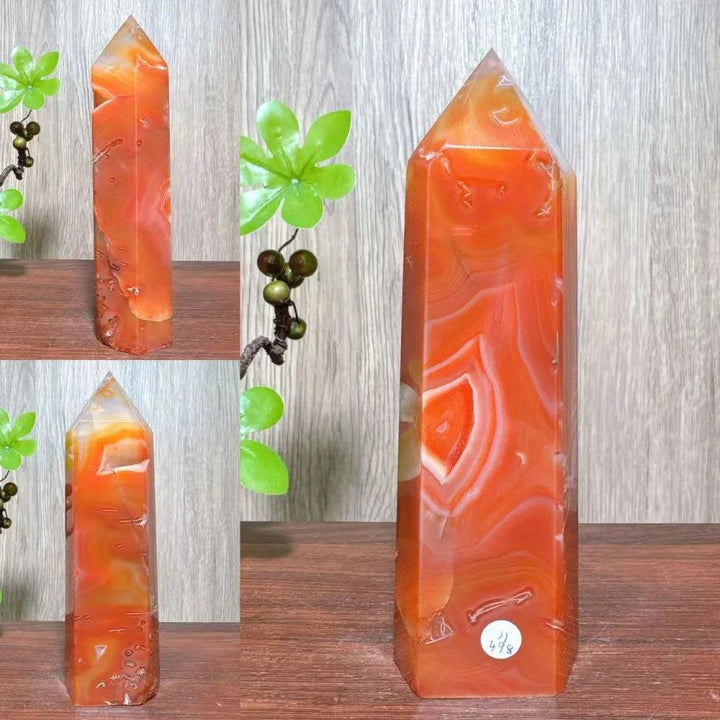 Natural red carnelian agate geode tower crystal, polished and faceted, for healing and home decor.