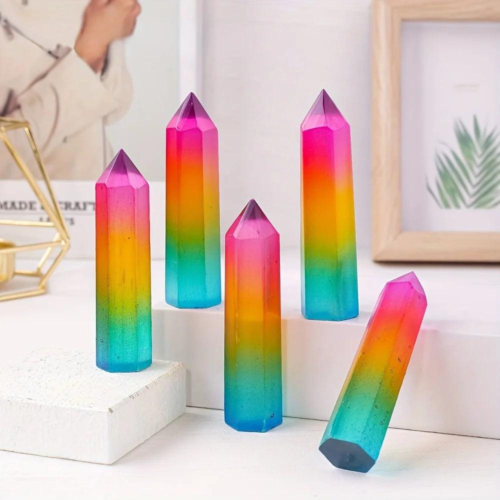 Vibrant rainbow aura selenite pillars with iridescent metallic colors, perfect for home decor and crystal healing.