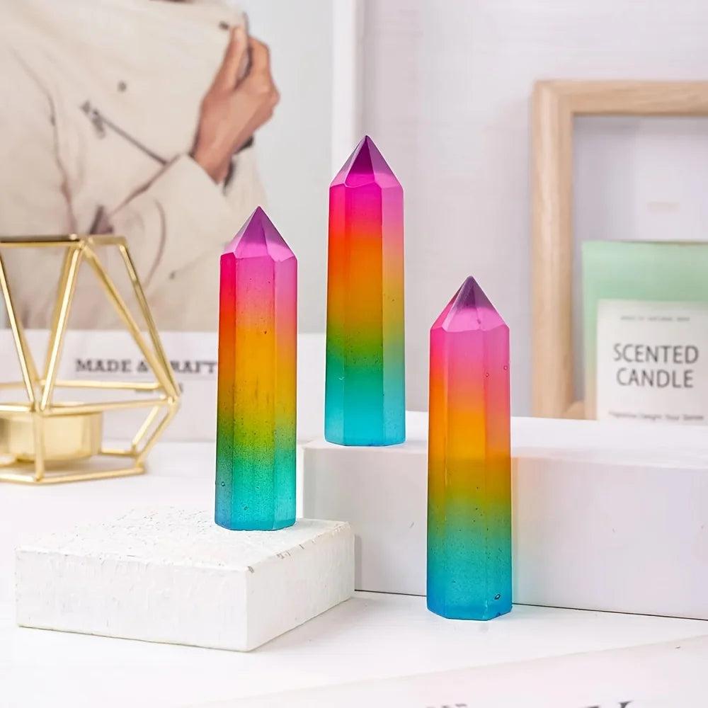 Rainbow aura selenite pillars with vibrant iridescent metallic colors for healing and home decor.