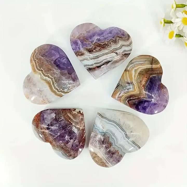 Polished Amethyst Agate heart sculptures featuring natural purple and banded patterns, perfect for romantic home decor.
