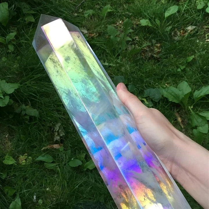 Large iridescent clear quartz crystal stone tower with vibrant rainbow aura electroplated finish.