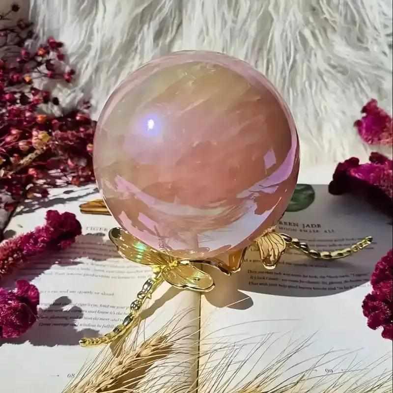 Gorgeous electroplated pink rose quartz sphere on a gold dragonfly stand, perfect for love, healing, and unique gifting.