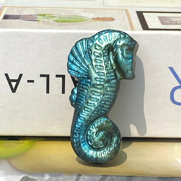 Handcrafted Labradorite seahorse crystal carving with iridescent blue flash, perfect for mystical home decor and energy.