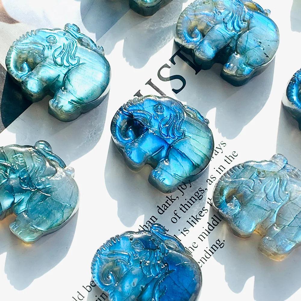 Handmade natural Labradorite elephant carving with vibrant blue and golden flash for spiritual healing and home decor.