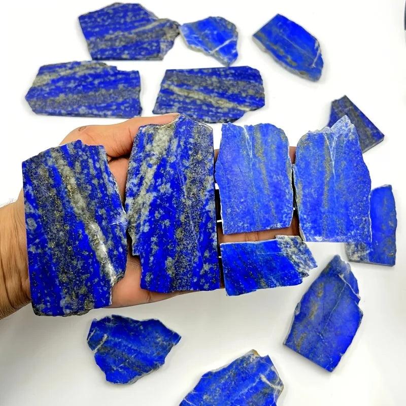 Polished royal blue lapis lazuli slabs with golden pyrite flecks, a healing crystal for wisdom.