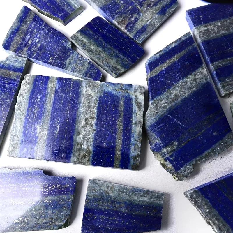 Polished royal blue Lapis Lazuli slabs with golden pyrite flecks and unique veins.