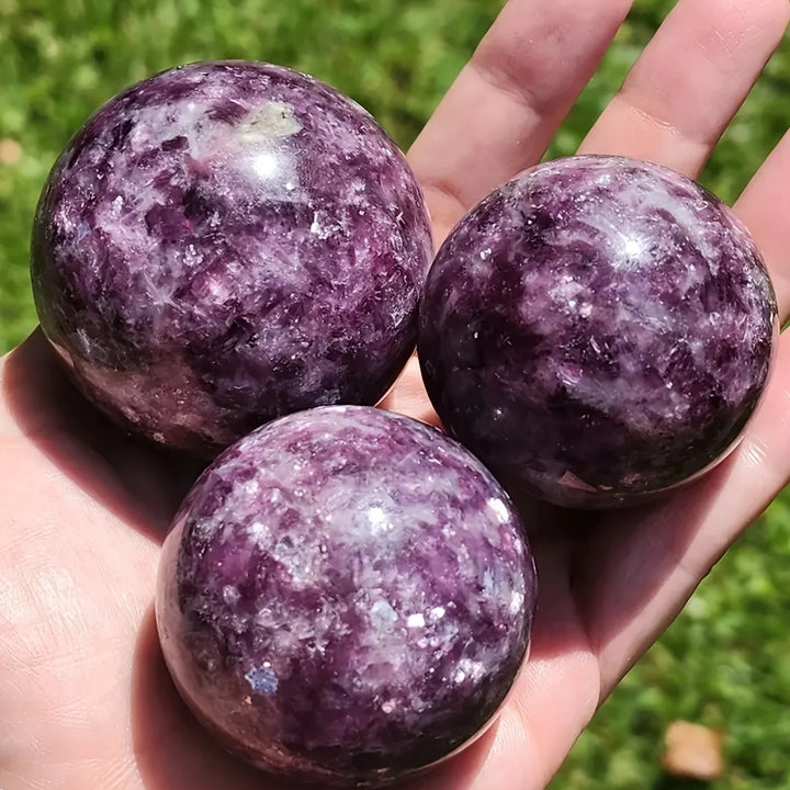 Three polished natural Lepidolite crystal spheres with purple mica, perfect for boho home decor and calming energy.