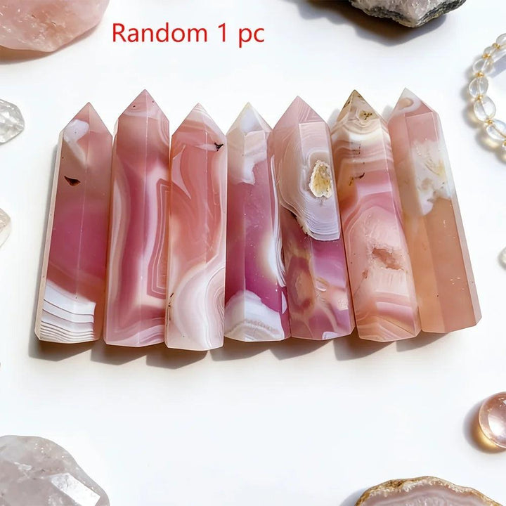 Polished pink agate pillar crystals with natural banded patterns for healing and home decor.