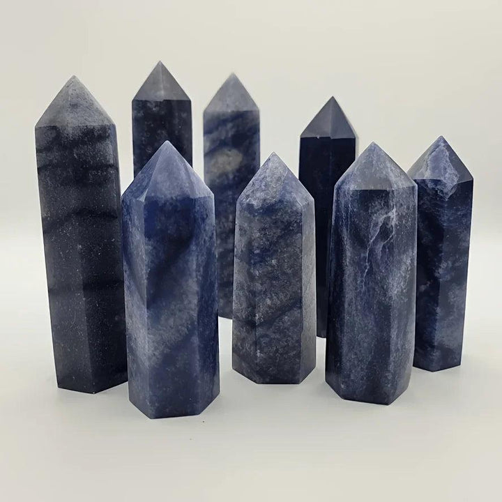 Polished Blue Aventurine obelisk towers with natural white and dark blue mineral banding.