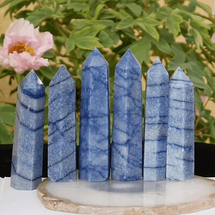 Polished Blue Aventurine obelisk towers with natural veining, perfect for healing and desk decor.