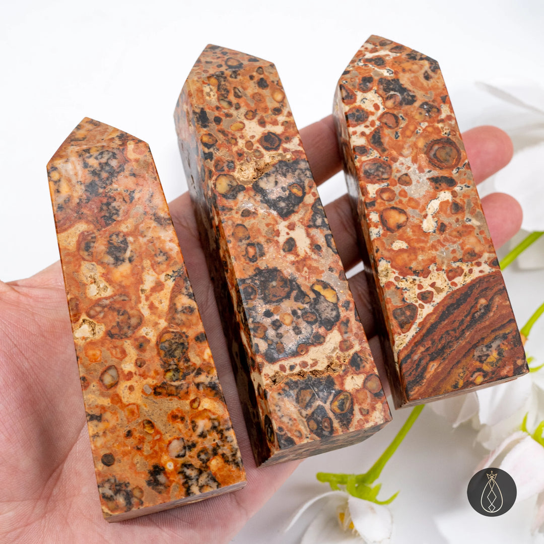Hand-carved natural Dragon Palace Relic Tower crystal, 6-8cm & 8-10cm, with unique brown, black, and orange patterns.