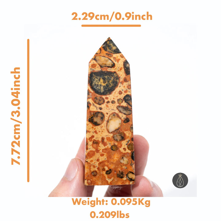Hand-carved Natural Dragon Palace Relic Tower, a unique healing crystal with earthy orange, black, and cream patterns.
