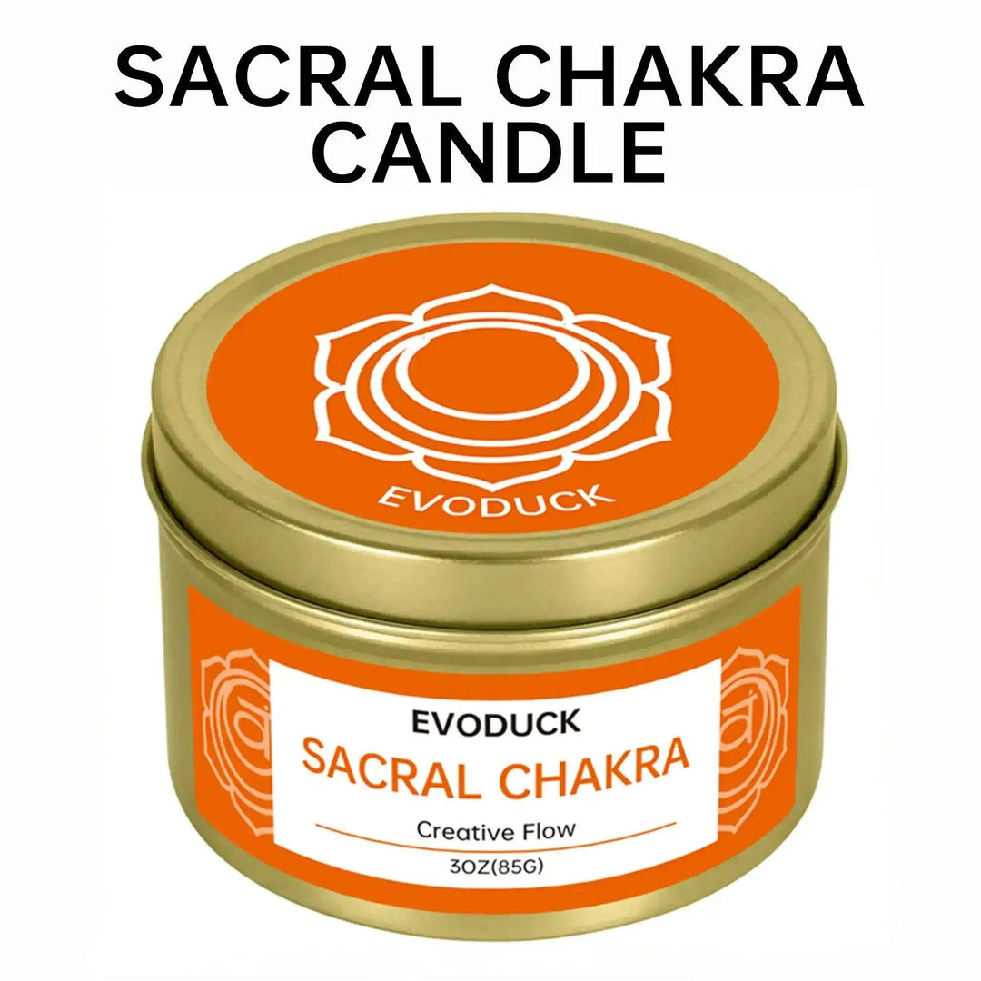 Orange Sacral Chakra soy candle in a gold tin with a symbolic lid, perfect for creative flow and intention practice.