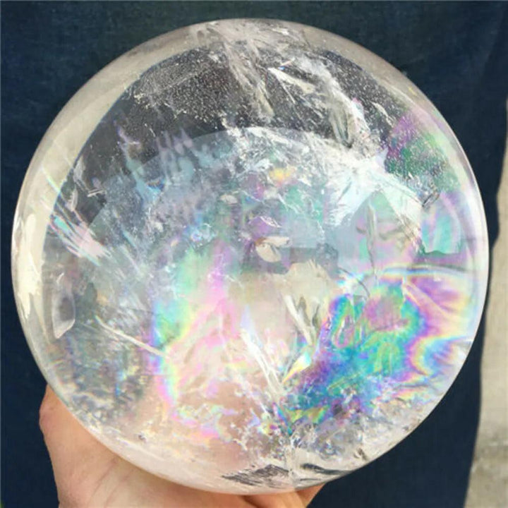 AAAA natural transparent white quartz crystal ball with iridescent rainbow inclusions for healing and home decor.