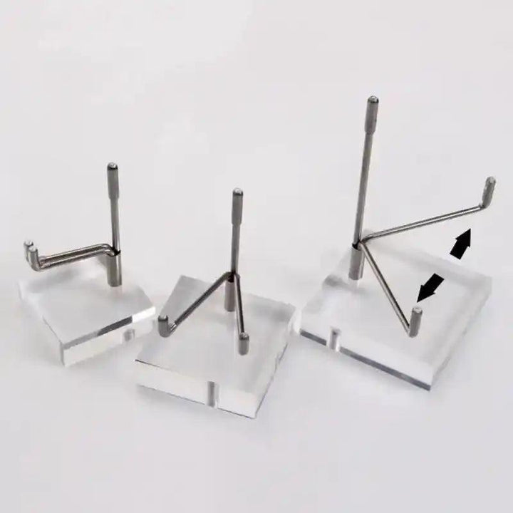 Three clear acrylic display stands with adjustable silver metal arms for crystals and gemstones.