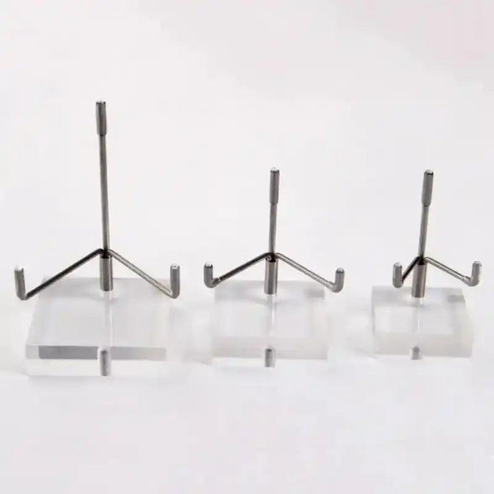 Three clear acrylic display stands with silver metal holders, perfect for showcasing minerals and gemstones.
