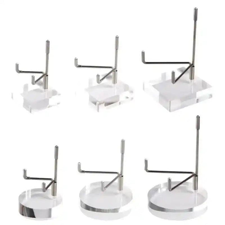 Clear acrylic mineral & gemstone display stands in various round and square sizes, featuring silver metal holders.
