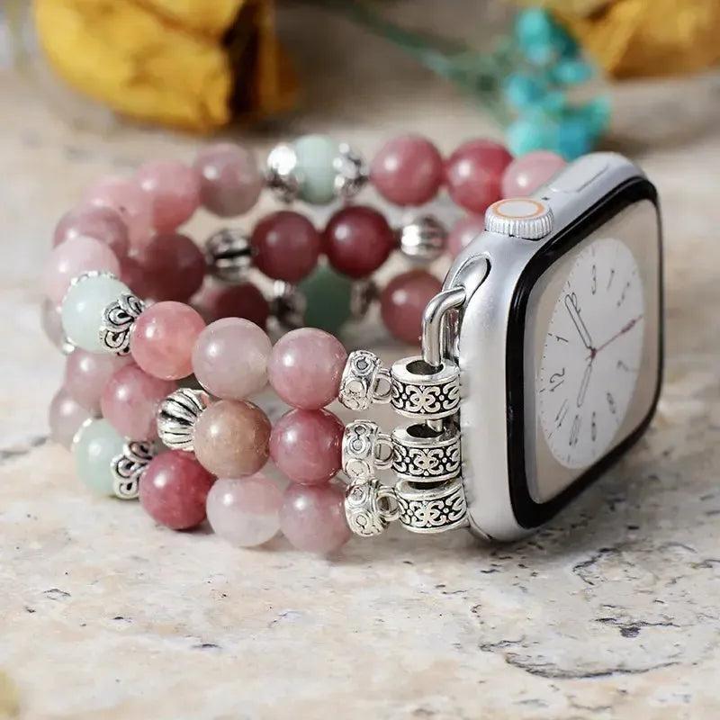 Pink and green agate beaded Apple Watch band with ornate silver accents, promoting emotional balance.