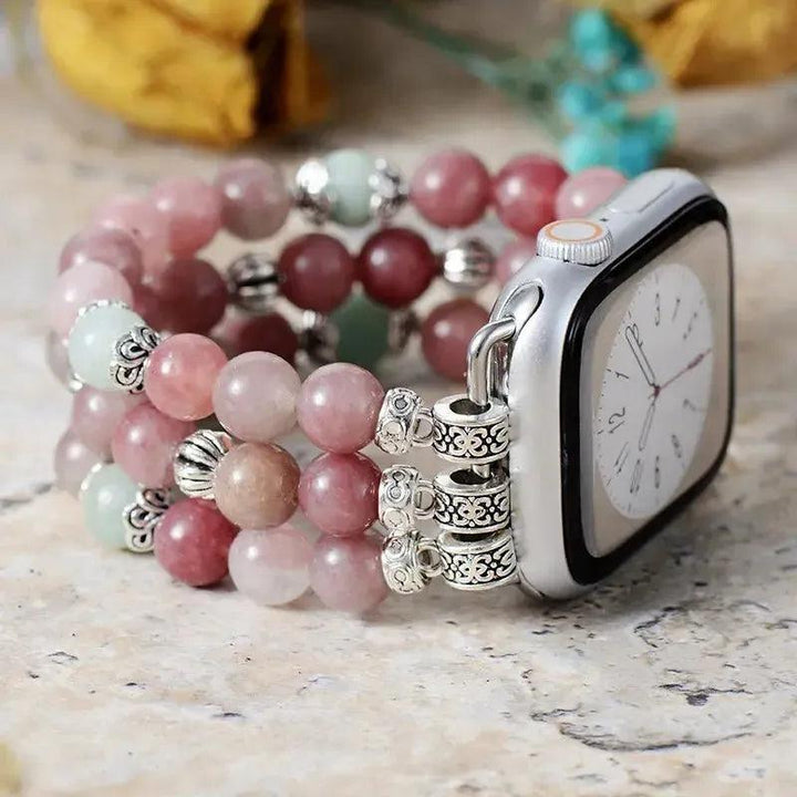 Pink and green agate beaded Apple Watch band with ornate silver accents, promoting emotional balance.