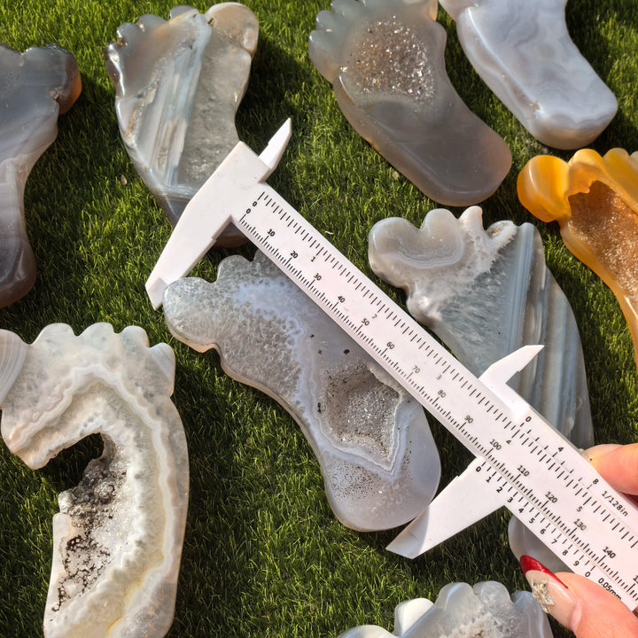 Agate Crystal Carved Foot Sculpture for Grounding Energy, showcasing a druzy geode interior and natural banding.
