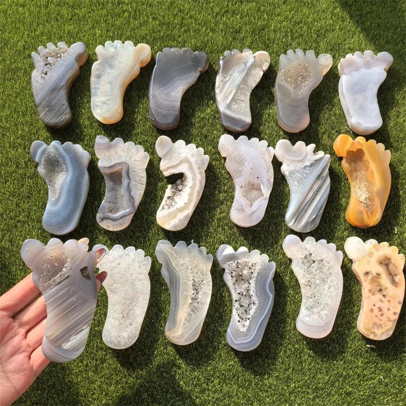 Agate Crystal Carved Foot Sculpture for Grounding Energy, featuring druzy geode interiors in various earthy tones.