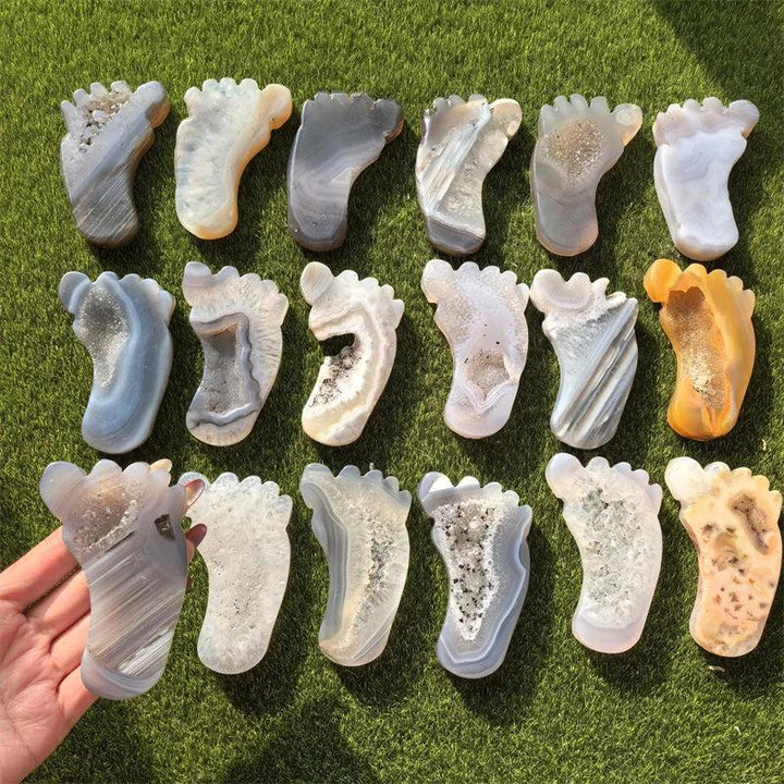 Agate Crystal Carved Foot Sculpture for Grounding Energy, featuring druzy geode interiors in various earthy tones.