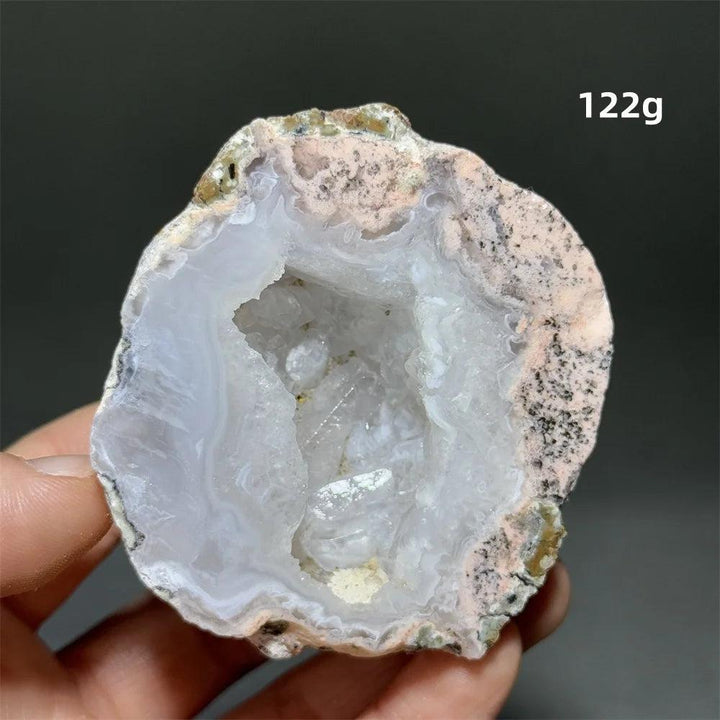 Natural Agate crystal cave egg with a sparkling white druzy interior, grounding and healing.