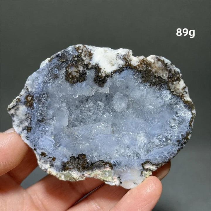 Natural Agate crystal cave egg with a sparkling blue druzy interior, weighing 89g, for grounding and healing.