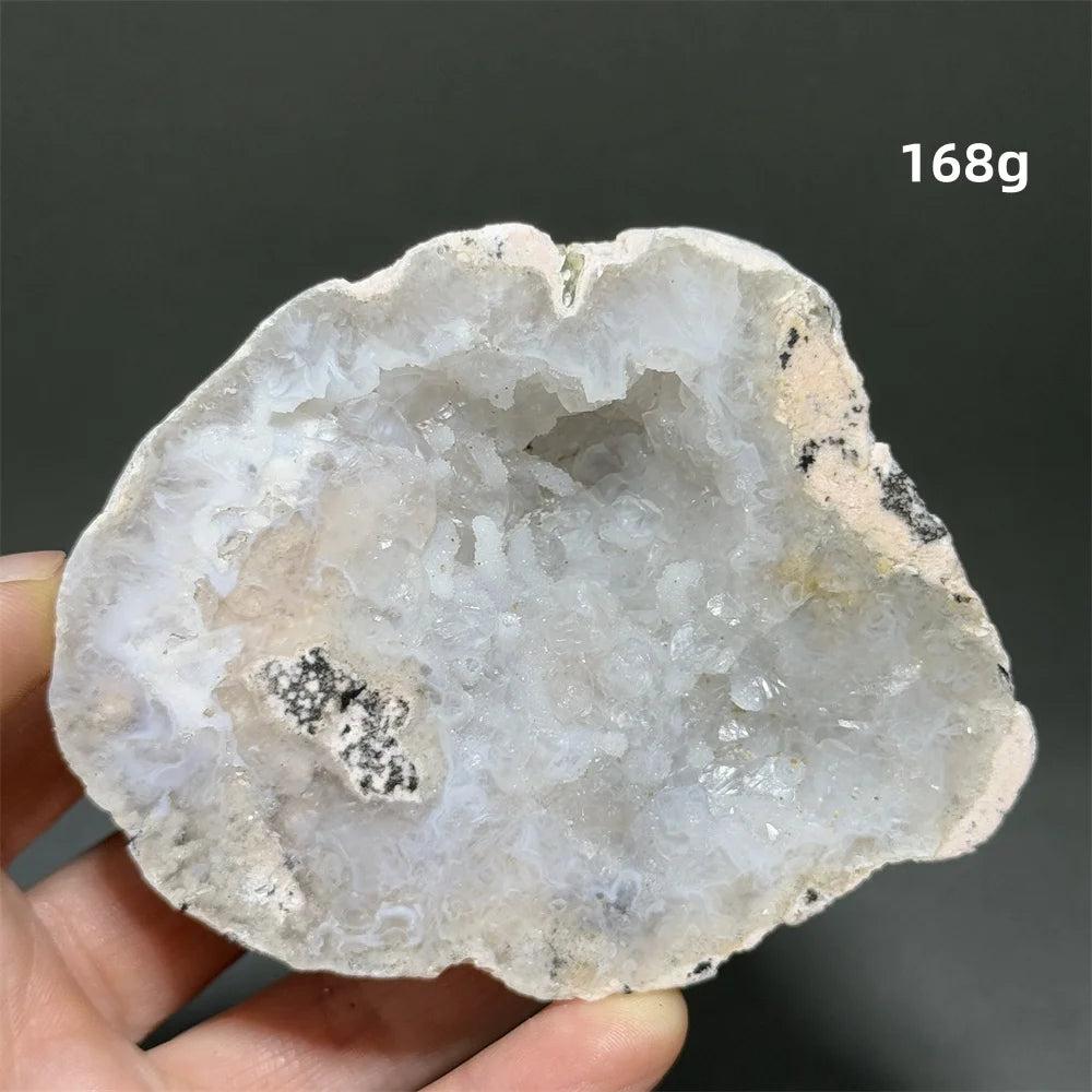 Natural Agate crystal cave geode egg with sparkling white druzy interior, grounding and healing.