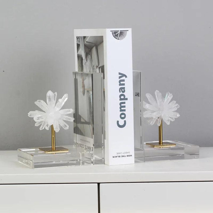 Clear quartz crystal bookends with gold stands, adding grounding and stability to your bookshelf.