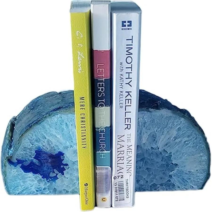 Stunning blue agate crystal geode slice bookends, polished to reveal layered banding, with a non-slip rubber base.