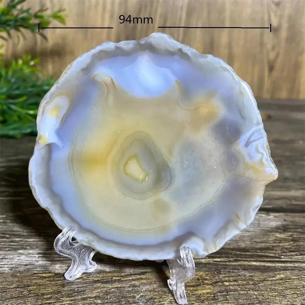 Agate Slice with Stand: 94mm polished natural agate with warm amber, cream, and translucent bands on a clear stand.