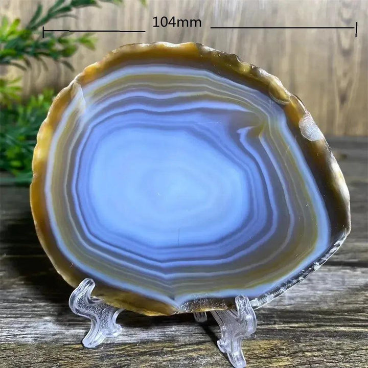 Stunning 104mm Agate Slice with Stand, showcasing warm amber, cream, and translucent blue bands for grounding energy.