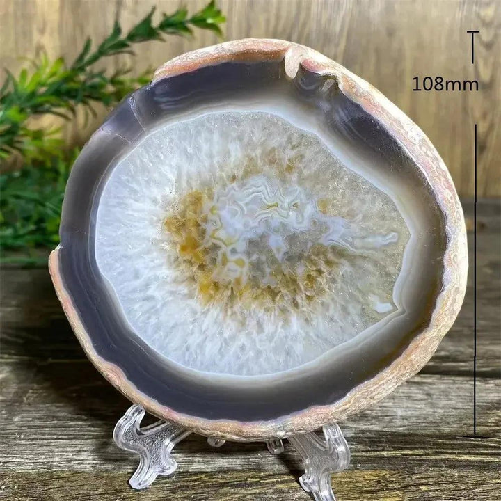 Stunning Agate Slice with Stand, showcasing warm amber, cream, and translucent bands for grounding and balance.