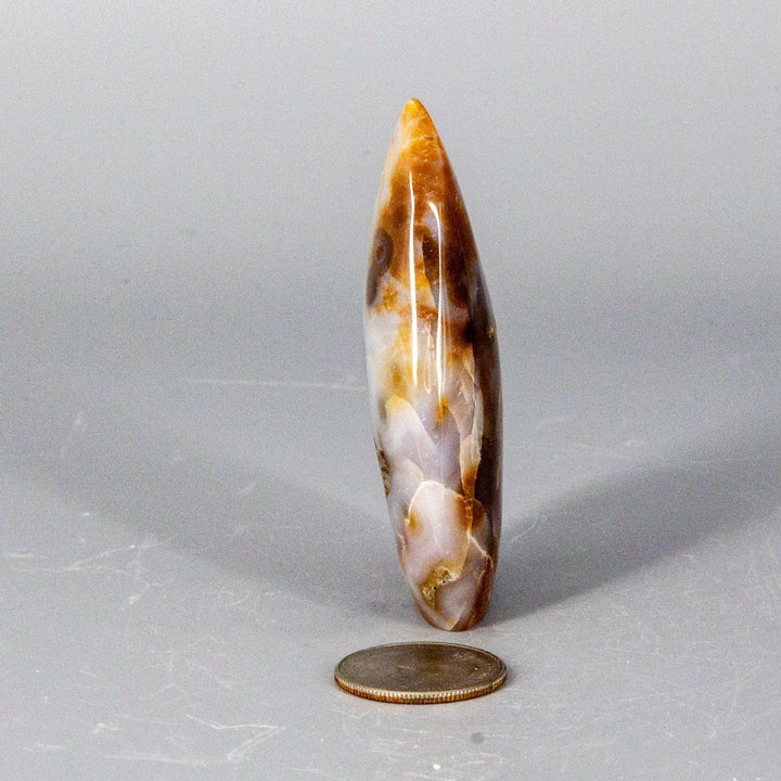 Agate Torch Freeform: tall, tapered crystal with warm, earthy tones and characteristic banding, ideal for meditation.