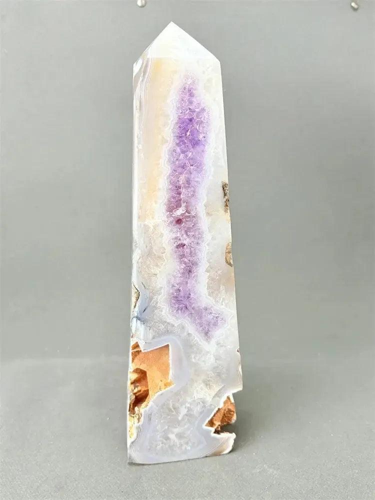 Polished Agate geode crystal tower with a sparkling purple druzy cavity and earthy brown, cream, and gold banding.