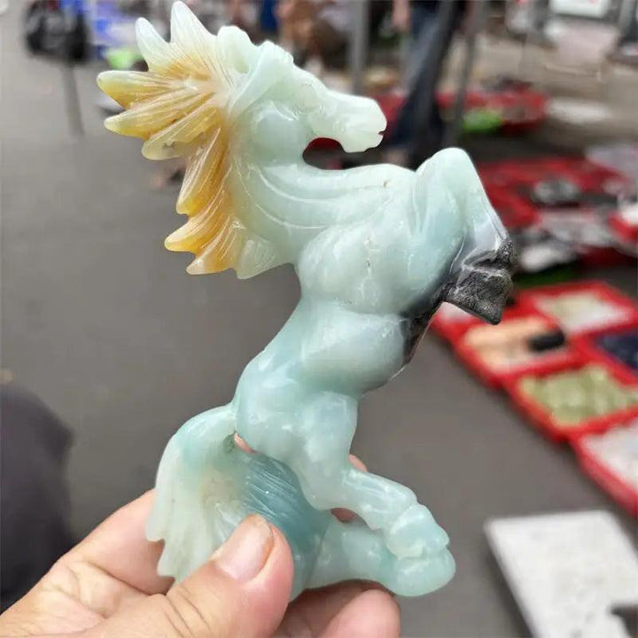 Hand-carved Amazonite horse statue with a polished seafoam finish, promoting calming heart and throat chakra energy.