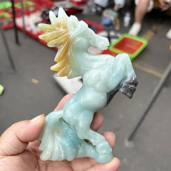 Hand-carved Amazonite horse statue with a polished, calming seafoam finish, perfect for heart chakra energy and decor.