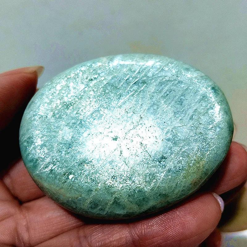 Polished Amazonite Crystal Palm Stone, a calming teal and cream natural specimen for peace and clear communication.