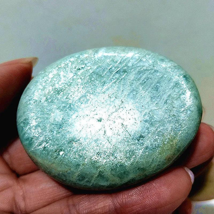 Polished Amazonite Crystal Palm Stone, a calming teal and cream natural specimen for peace and clear communication.