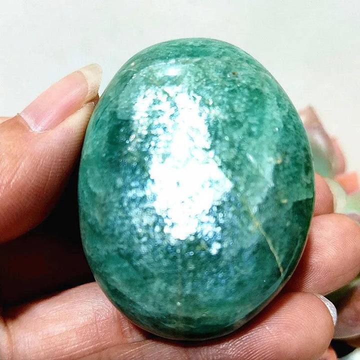 Amazonite Crystal Polished Palm Stone: Smooth, teal and cream stone for peace, calm, and clear communication.