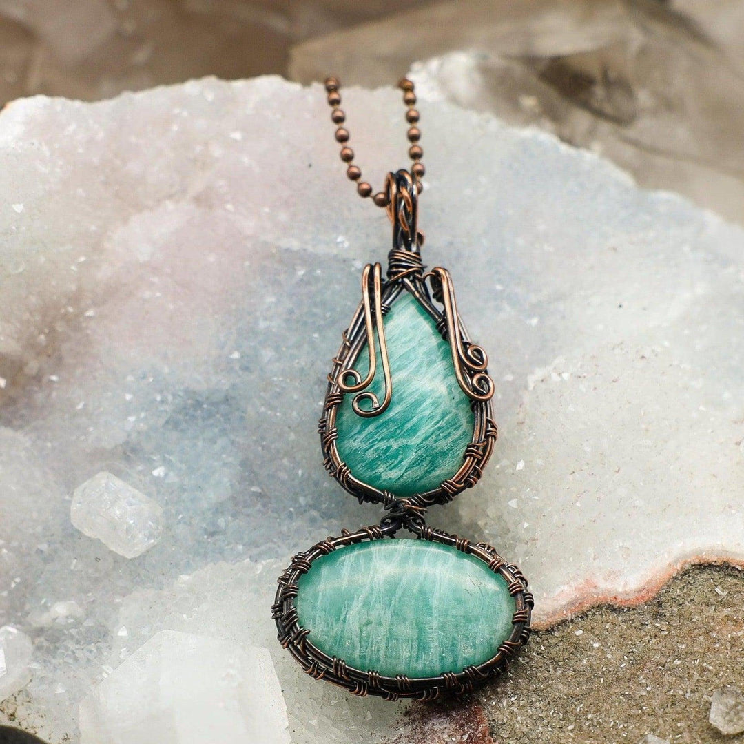 Dual Amazonite Wire Wrap Pendant: 3-inch handcrafted copper pendant with two calming turquoise-green Amazonite crystals.